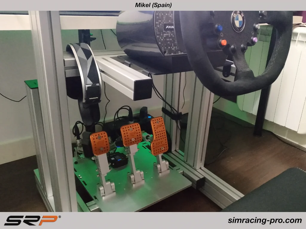 SRP GT-R pedals closeup Mikel Spain setup showing pneumatic braking system and SKF bearings - professional durable sim racing pedals